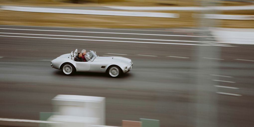 Two guys in speedy car